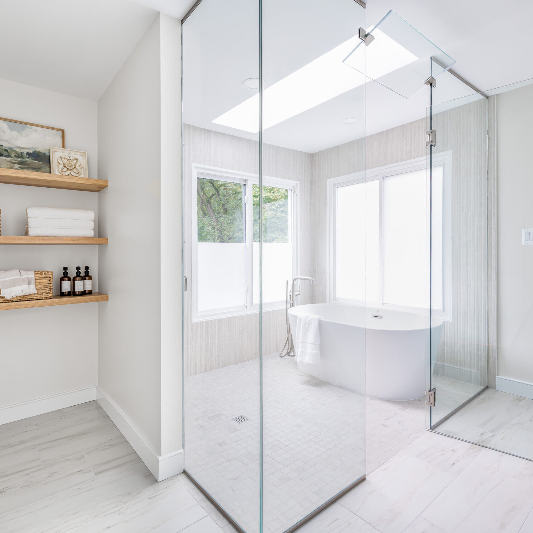 Freedom - Nguyen (024) bathroom with glass and shelves and custom bath after Home Additions in Vienna